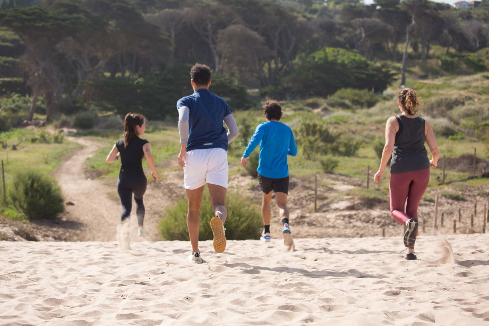 Friends training together outdoors